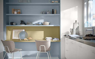 Kitchen with blue and straw yellow shelving