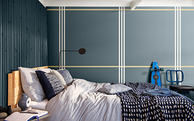 bedroom with deep blue walls and a checkerboard pattern